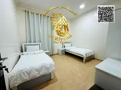 Two furnished rooms and a living room for monthly rent in Al Muwaihat 3 | Includes bills and interne