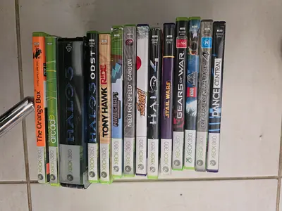 Bundle of Xbox 360 Games including The Orange Box, Minecraft, NFS Carbon and more.
