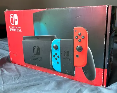 Nintendo Switch (Neon Red/Blue) Console - Barely used, Very Good Condition