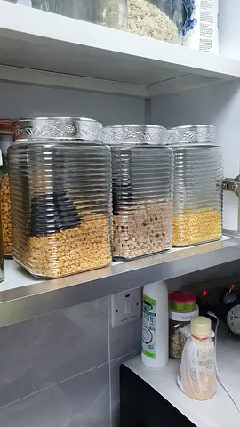 Set of Glass Kitchen Storage Jars with Decorative Lids
