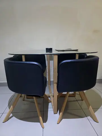 Glass Top Dining Table with 4 Black Upholstered Chairs