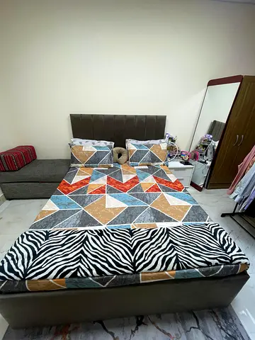 Queen size bed frame with storage inside and medicated mattress covered for sale