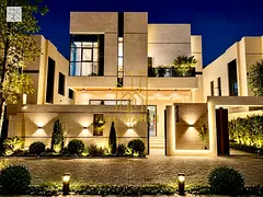 For sale in Al Helio 2, Ajman, with a private pool and natural stone facade. Includes registration a
