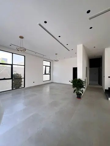 Property Finder: Luxury villa for sale in Al Hoshi, Sharjah, featuring a full stone façade and modern architec