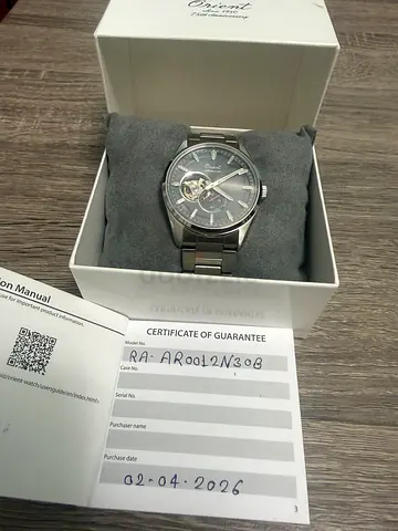 Automatic stainless steel with open heart dial (boxed, papers) 75th Anniversary limited edition
