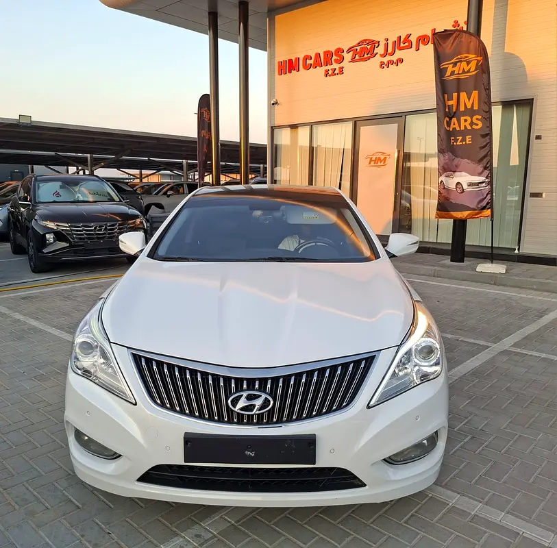 Hyundai Grandeur 2014 — photo 1 of 16