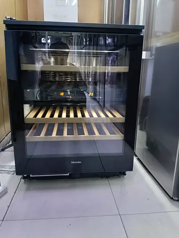 I am salling Miele Built-in Wine fridge brand new latast model little use good condition perfect wor