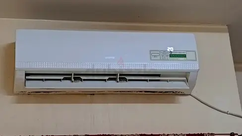 Used wall-mounted split air conditioner - good working condition