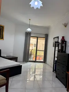 Mankhool next to golden sands 1  furnished room with balcony for Indian single male rent 3k