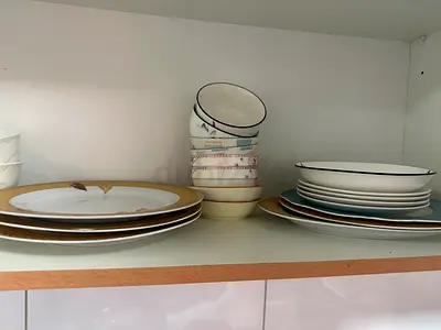 Set of used dinner plates and bowls – mixed porcelain set