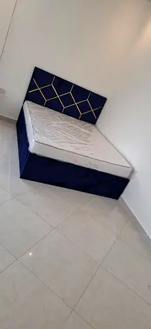 Queen bed frame with mattress - navy upholstered headboard