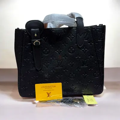 Louis Vuitton Monogram Empreinte Leather Handbag in Black