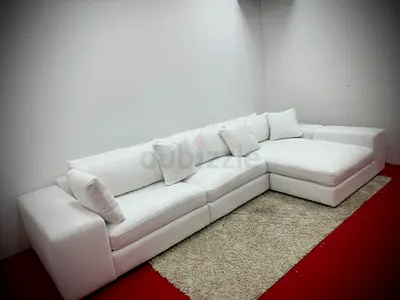 Like new condition eichholtz brand lshape sofa
