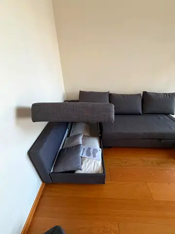 L shape sofa bed with hidden storage - dark grey, good condition