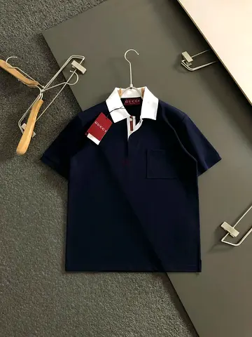 Gucci navy polo shirt with white collar – new with tags