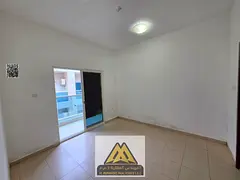 2BR hall in City Tower, Al Nuaimiya 3, balcony, 2 baths, free parking, AED 40k yearly, 4 payments.