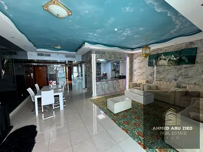 Luxury fully furnished 2BR apartment in Corniche Residences Ajman—spacious, free AC, parking, gym, pool, garden. Rent AED 80,000 yearly in 4 payments.