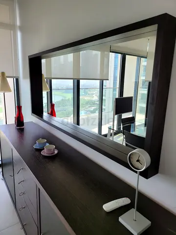 Dark wood dresser with large mirror and multiple drawers - good condition ( SIDEBOARD-LIGNE ROSET )
