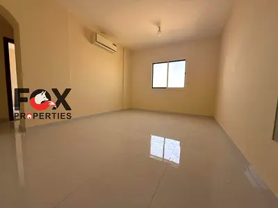 Staff accommodation apartment in Al Jurf 3, master bedroom, balcony and 2 bathrooms, close to all services.
