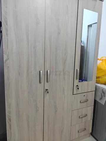 3-door wooden wardrobe with mirror and drawers - good condition