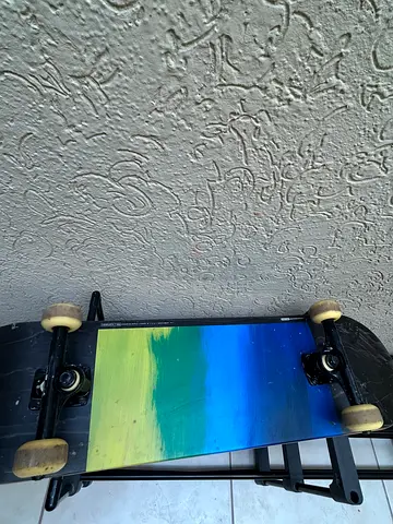 Standard Skateboard with Blue and Yellow Graphic