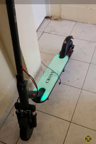 Lightly used Crony electric scooter - foldable deck, LED lights