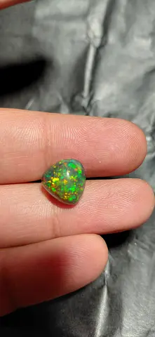 Green opal heart-shaped loose gemstone — eye-catching play of color
