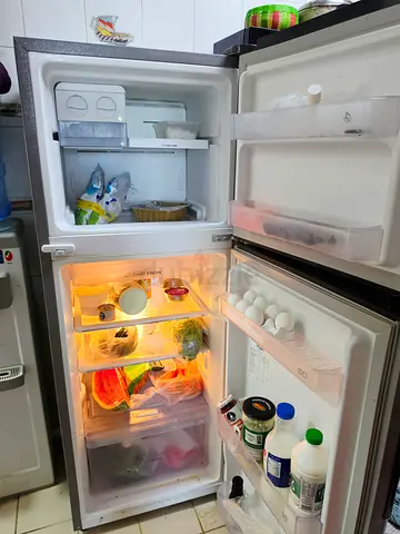 Used Double-Door Refrigerator with Freezer — Good Working Condition