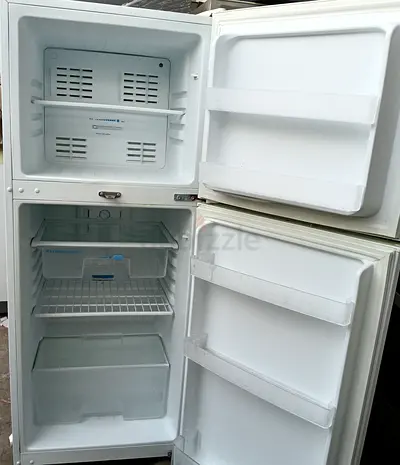 Used top-freezer refrigerator - white, double door