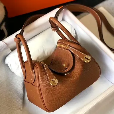 Hermes Lindy Mini Bag In Gold Clemence Calfskin