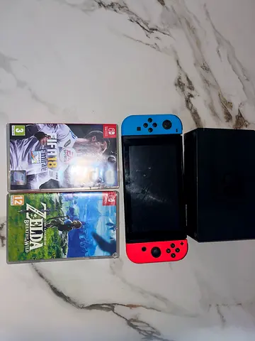 Nintendo switch for sale and two games for sale