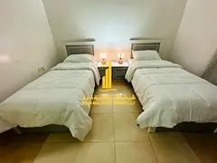 Brand new, luxurious two-bedroom apartment with a living room, fully furnished with brand new, high-