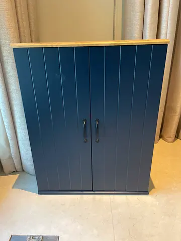 Blue two-door wardrobe/cupboard with wooden top – good condition