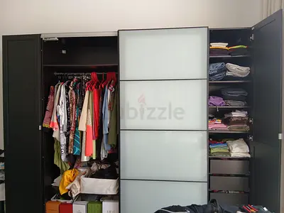 Black Sliding Door Wardrobe with Shelves and Hanging Rail - Good Condition