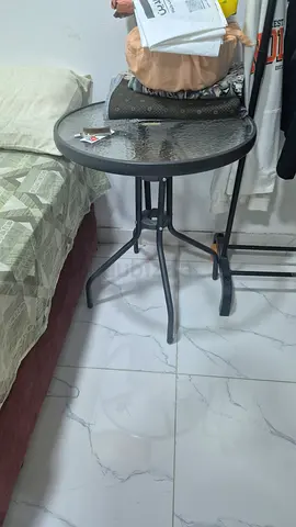 Small round glass-top bistro table - good condition