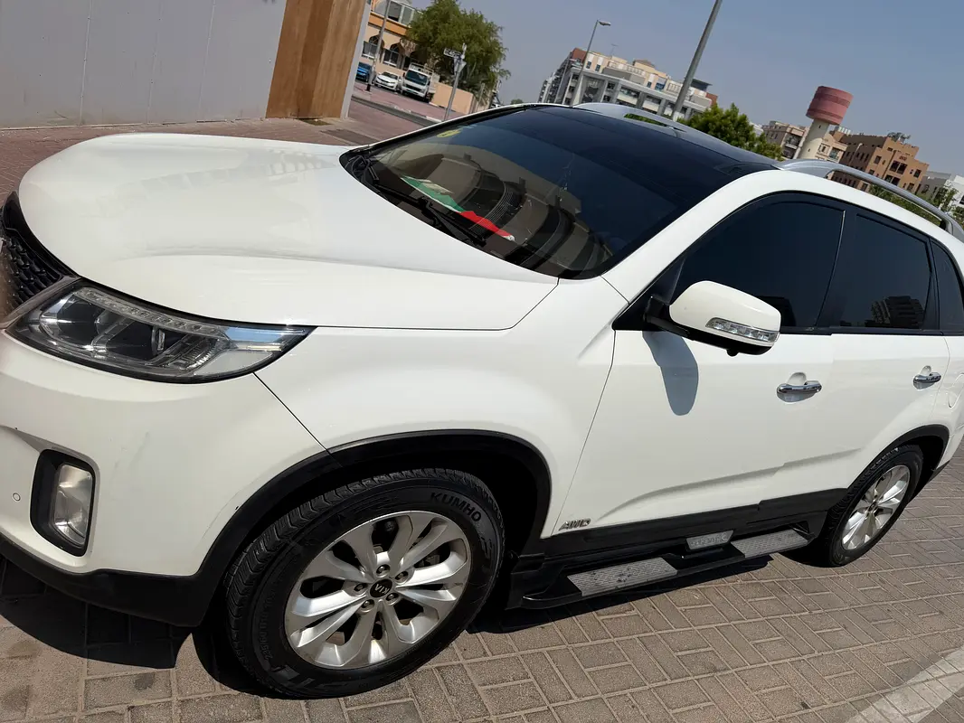 Kia Sorento 2014 — photo 1 of 8