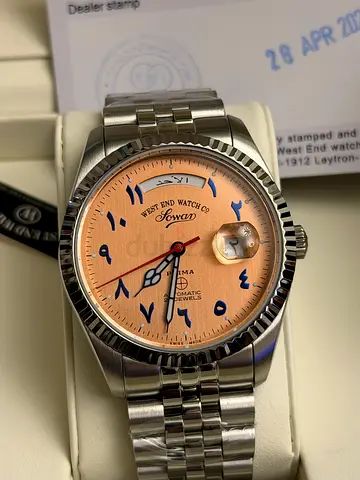 Mens stainless steel automatic watch with Arabic numerals and date window