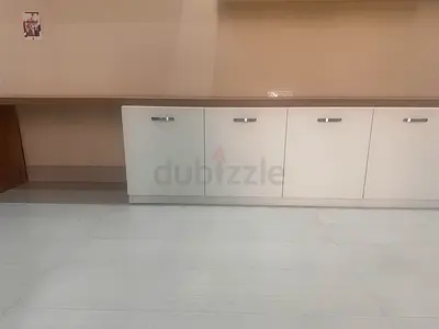 Wall-mounted low storage cabinet with countertop - white