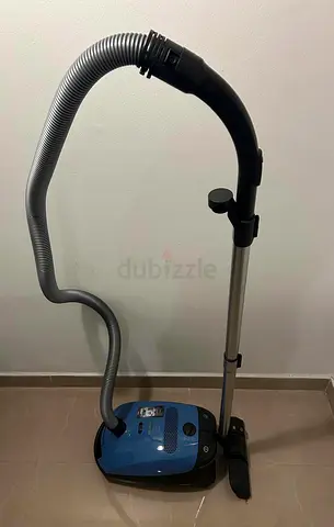 Used canister vacuum cleaner in very good working condition