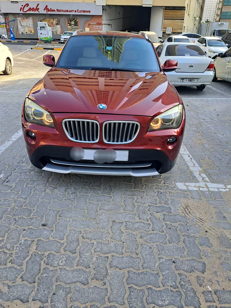 BMW X1 2011 — photo 1 of 10