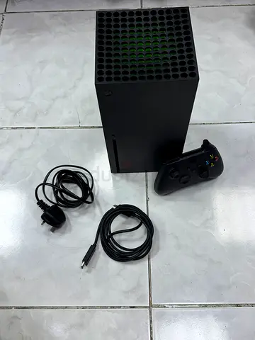 Xbox Series X console with controller and cables - good working condition