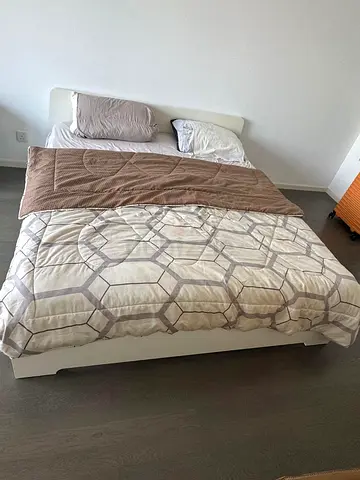 Excellent condition (Ikea brand) King size bed and high quality mattress for sale.