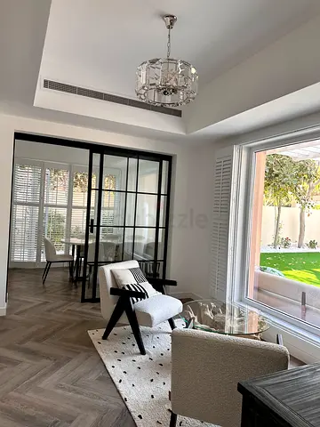 Clear crystal and silver chandelier from white  velvet