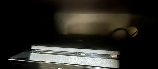 PS4 slim for sale 1TB with 4 controllers and a game