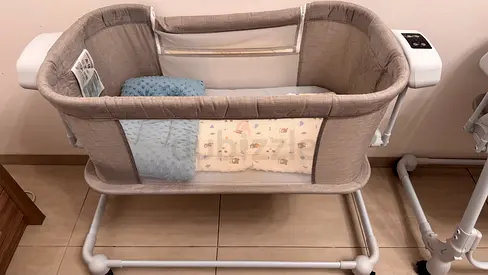 Gently Used Bedside Bassinet - Breathable Mesh, Wheels, Close-to-Parent