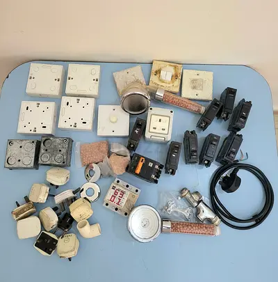Mixed electrical switches, sockets, boxes and fittings - used salvage lot