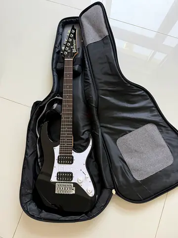 Black Solid Body Electric Guitar with Gig Bag - excellent  Condition