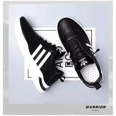 Black mens casual sneakers with white sole and stripes - size available