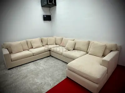 Beige color cratebarrel Ushape sofa