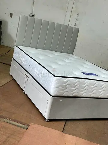 Queen size upholstered bed with mattress and storage base - light grey